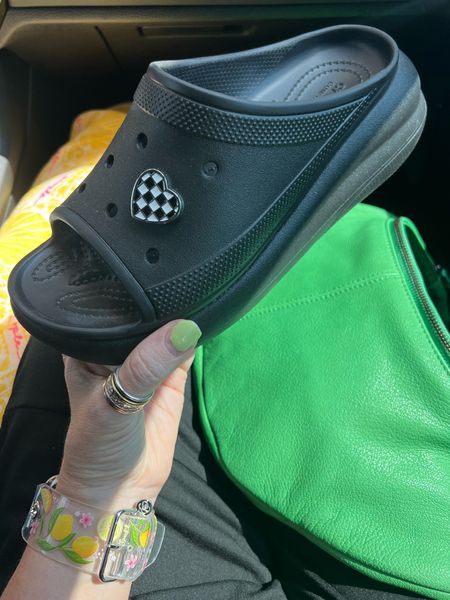 I got these adorable platform crocs on vacation and OMG I just love this little 🏁 charm added to them!! 
I size down in crocs! I think mine are the older ones since I bought mine at the outlets but I linked the similar new ones. 