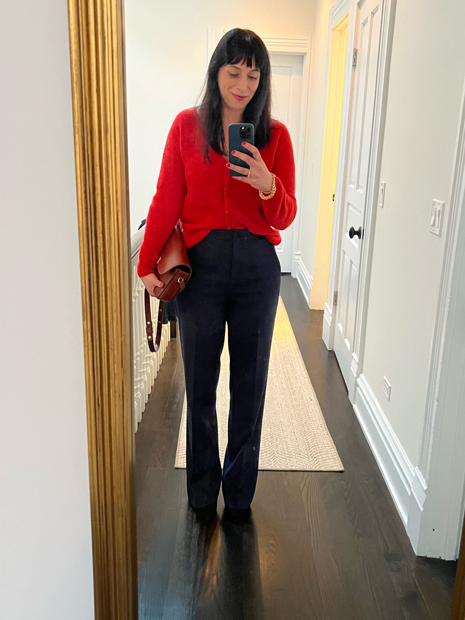 My favorite color combination these days. Wearing wide leg pants from Sézane, katie babies, and the barry sweater in red. 

#LTKover40