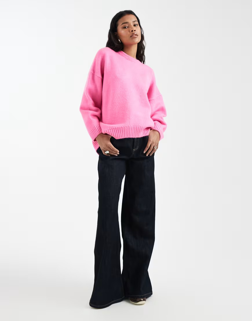 ASOS DESIGN oversized crew neck sweater with curved hem in bright pink | ASOS (Global)