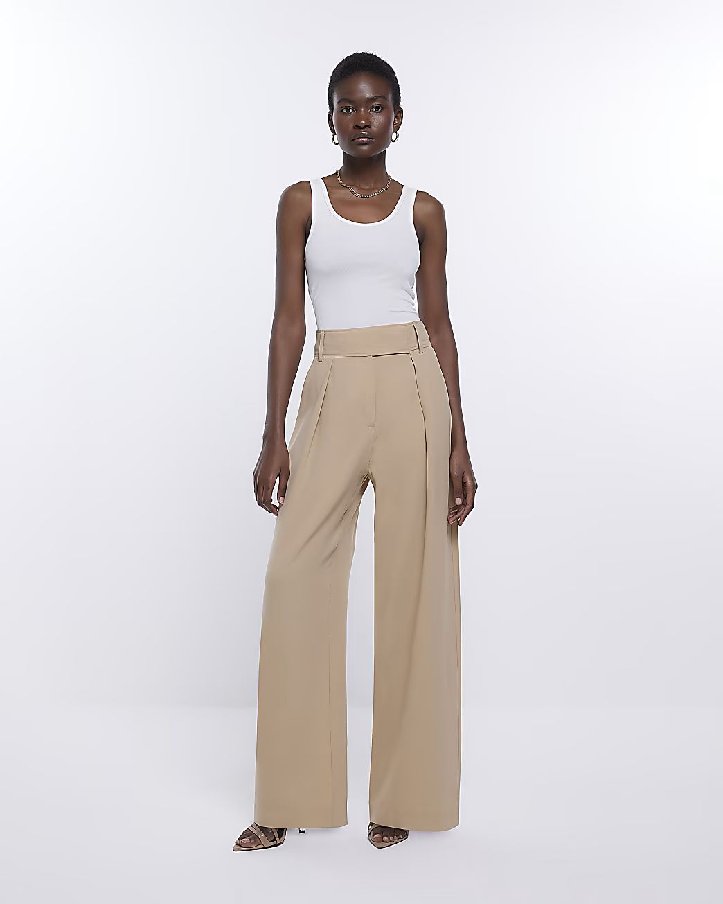 Beige wide leg pleated trousers | River Island (UK & IE)