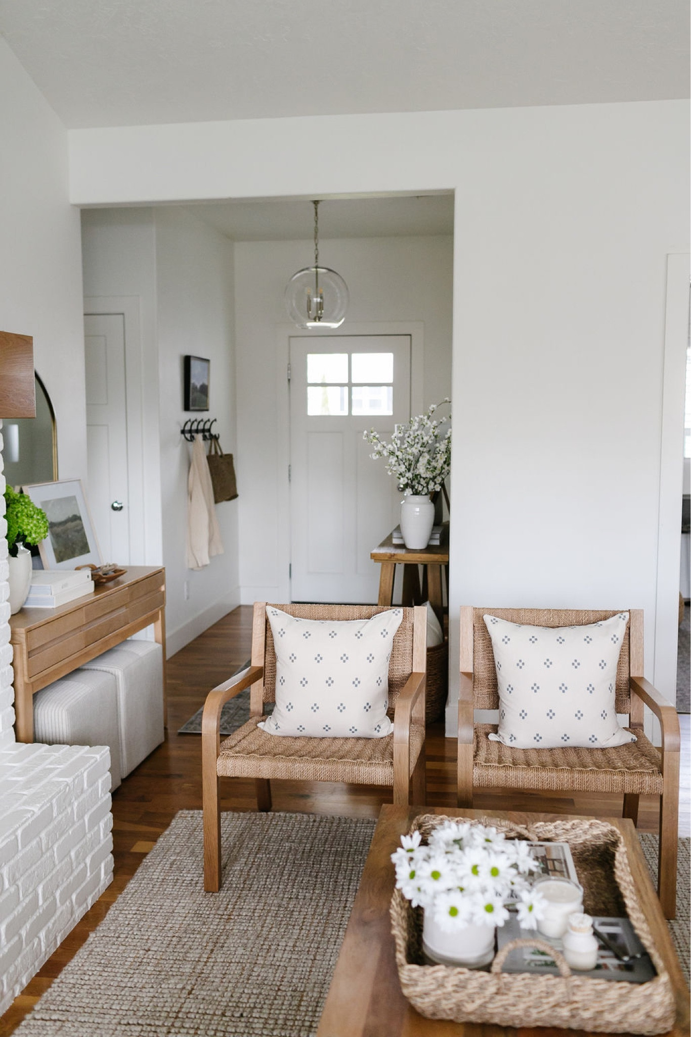 Summer decor perfect for a living room - a small vase filled with fresh or faux flowers, throw pillow covers in summer colors!

#LTKSeasonal #LTKFind #LTKhome