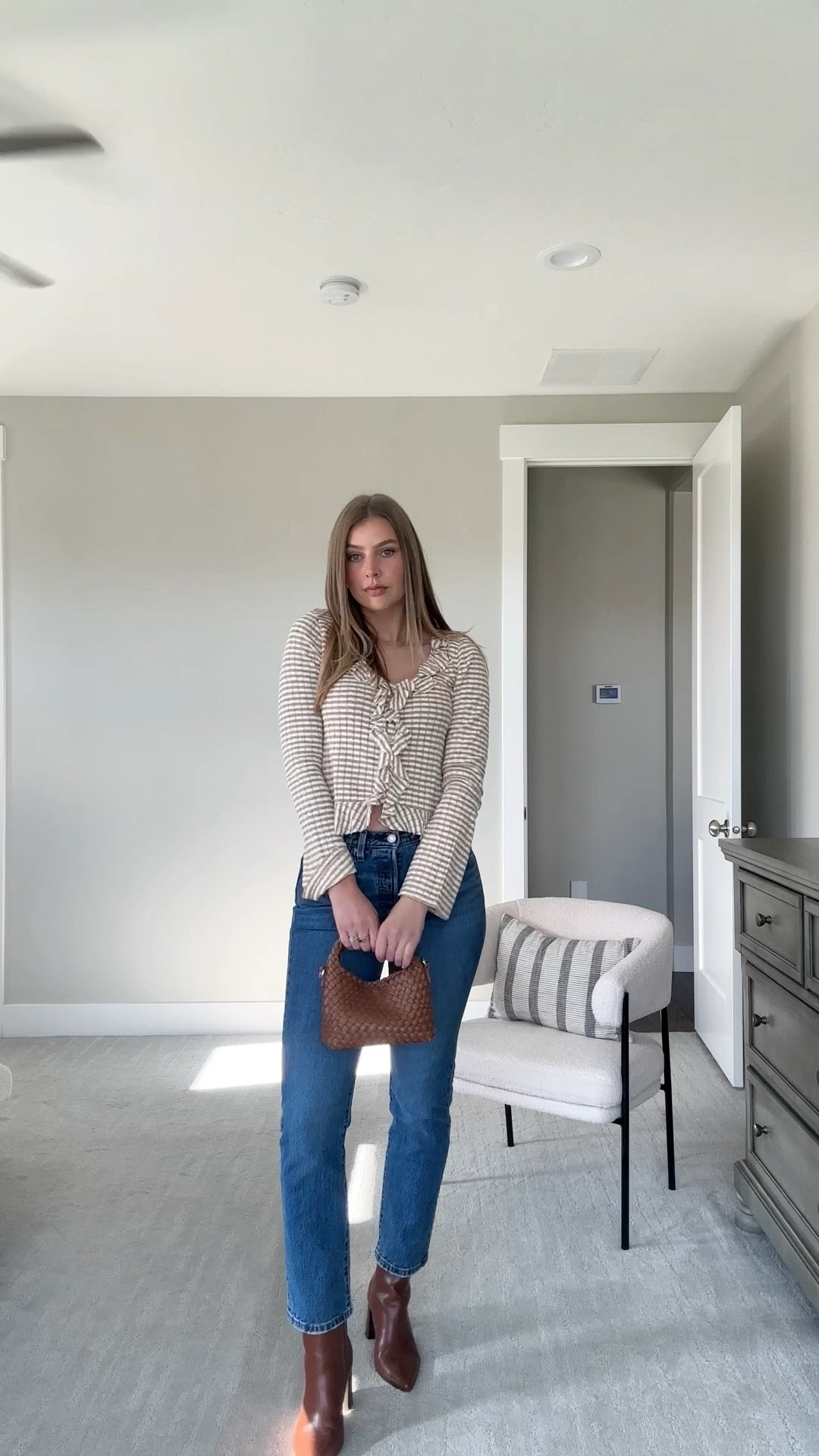 Stripped ruffle cardigan - medium, Levi’s jeans - 28/30, Amazon quilted bag, boots are old 

#LTKfindsunder100