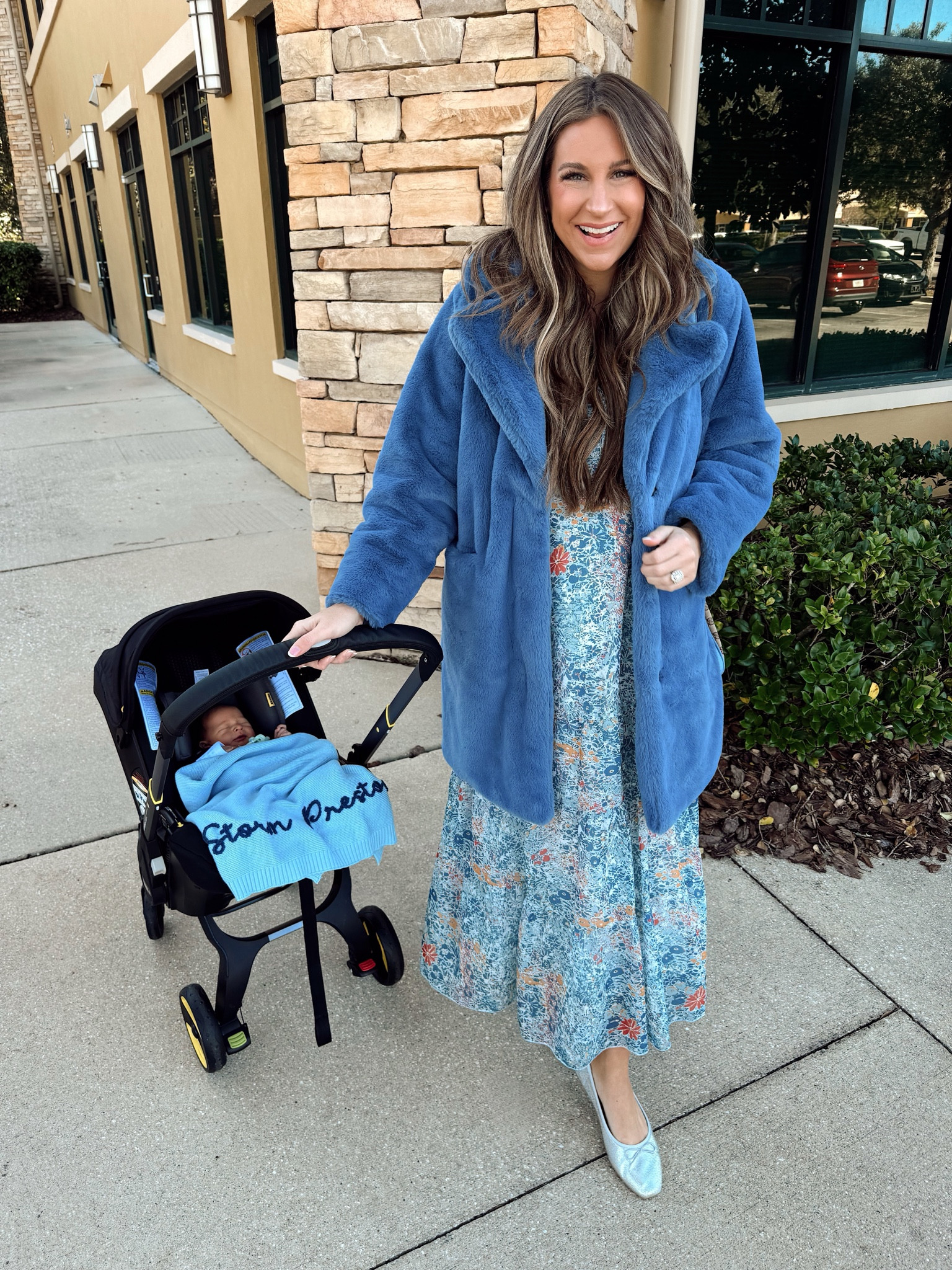 Baby’s first outing! In a size medium in dress and medium in coat all on Amazon! 