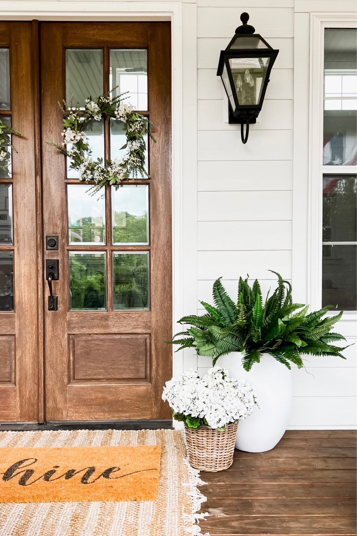 Amazing faux ferns at an amazing price! I have two in this planter. Currently almost half off! Front porch decor plants trees and flowers geraniums hydrangeas basket rattan resin outdoor planters wreath summer home decor outdoor lighting lantern southern porch farmhouse style layered doormat and jute scatter rug oversized welcome mat hello sunshine 

#LTKsalealert #LTKhome #LTKstyletip