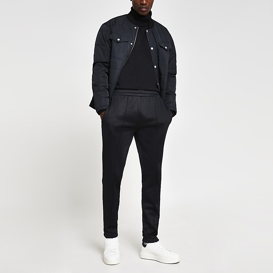 Navy slim fit roll neck jumper | River Island (UK & IE)