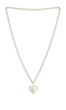 Roxanne Assoulin Mini Puffy Heart Necklace in Silver from Revolve.com | Revolve Clothing (Global)
