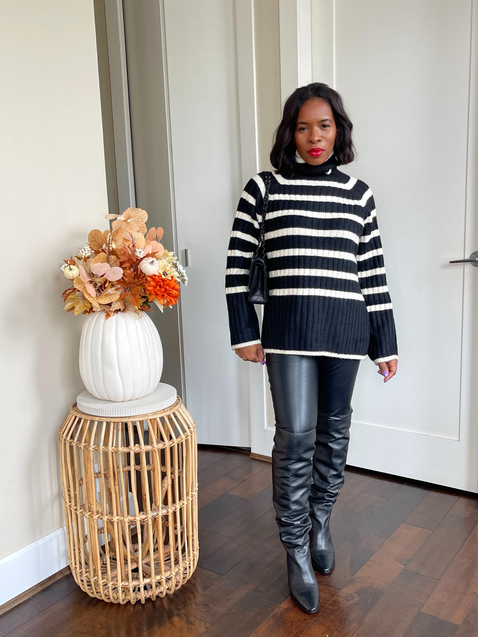 Love a black and white stripe outfit with faux leather leggings 

#LTKstyletip #LTKSeasonal #LTKover40