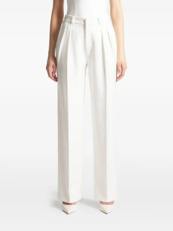 Julie in white pinstripe twin-pleat tailored trousers | Farfetch Global