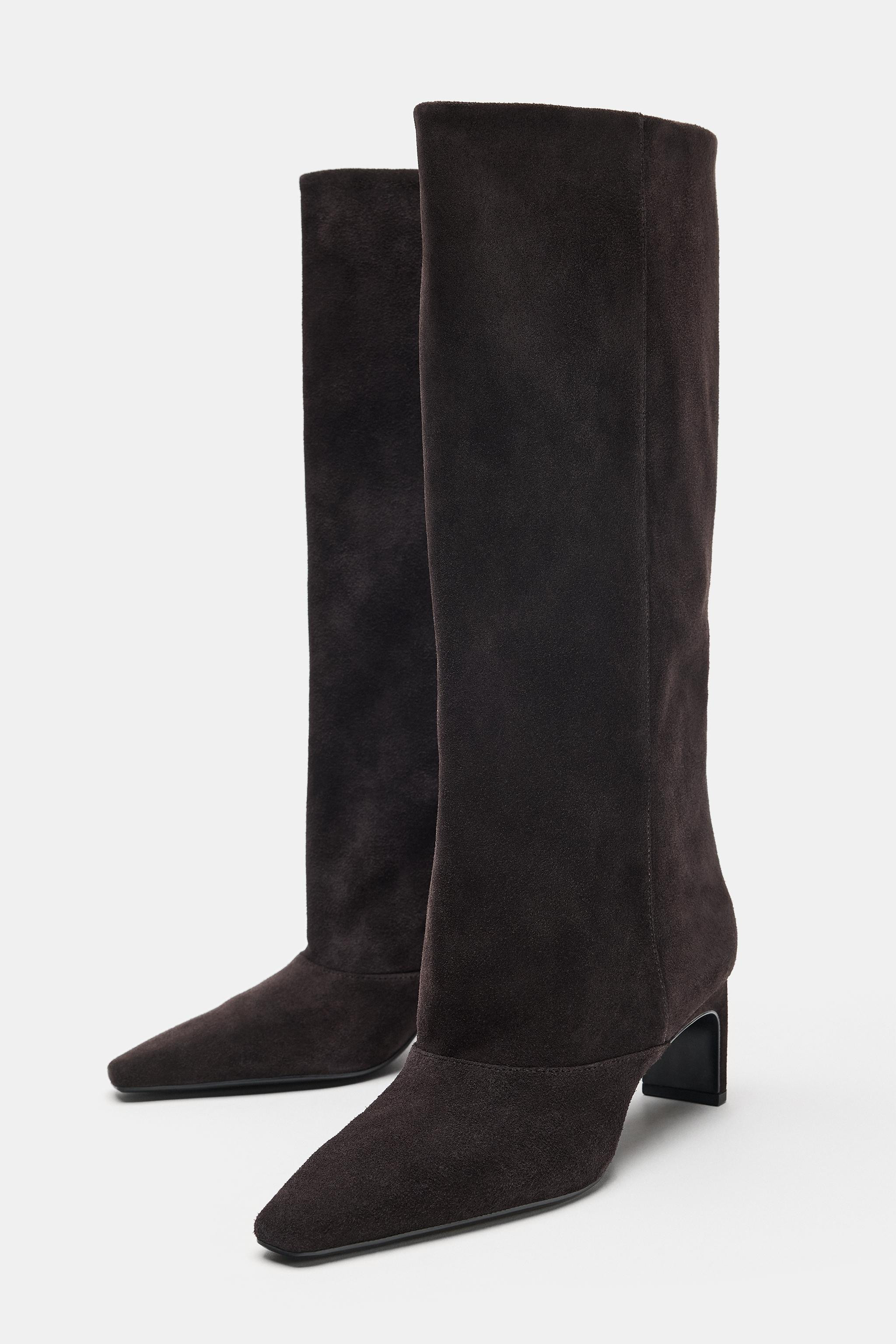 Split suede heeled boots. Topstitching detail on the top. Pull-on design. High leg. Mid block hee... | Zara UK