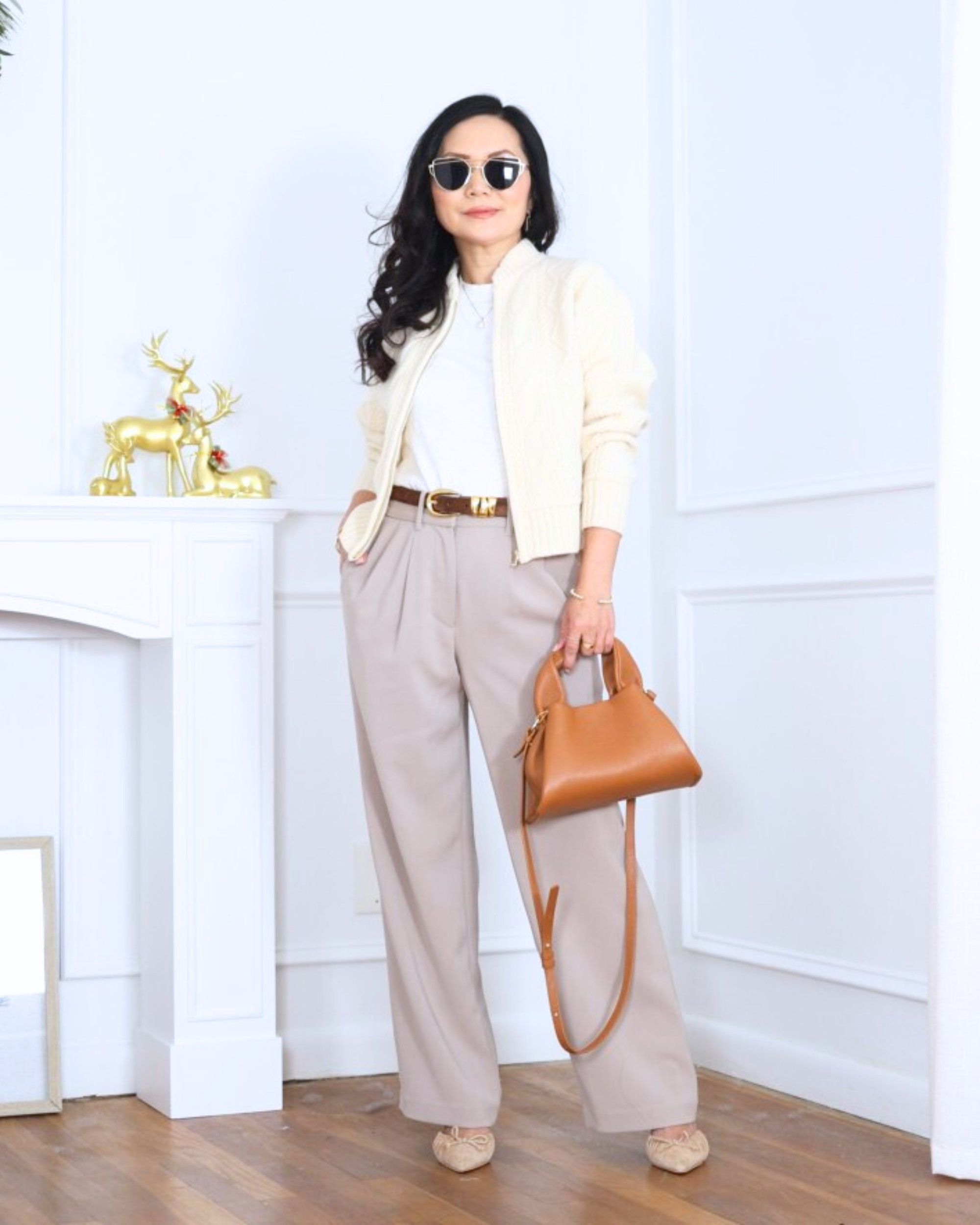 Cable knit bomber jacket from J.Crew paired with wide leg pants and a sleek bag from Quince—easy layers, relaxed structure, and that effortless put-together feel I always reach for. I’m 5’2, wearing size XS.

#LTKPetite #LTKOver40 #LTKootd