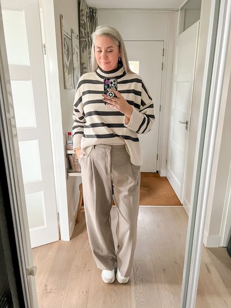 Still sick but I had one meeting I had to attend so comfy and cozy it is. Uniqlo x Comptoir des Cotonniers jersey trousers paired with and oversized striped knitted sweater and Skechers shoes. 



#LTKmidsize #LTKstyletip #LTKover40