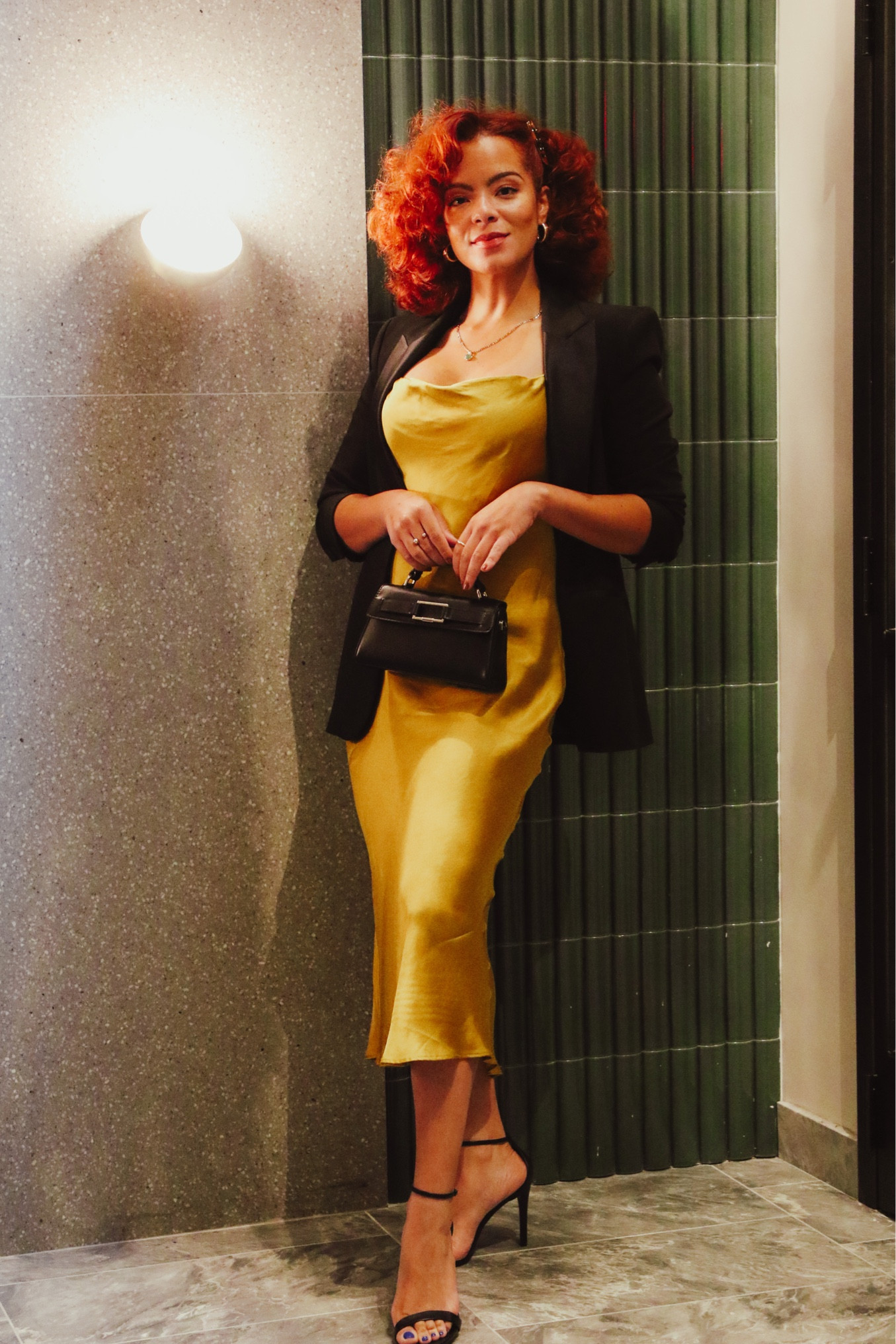 Wearing a yellow satin slip dress with a black blazer and heels for a casual chic look. Pair it with a small purse and gold accessories. 💚 #casualchicoutfits 

#LTKFind #LTKxNSale #LTKSeasonal