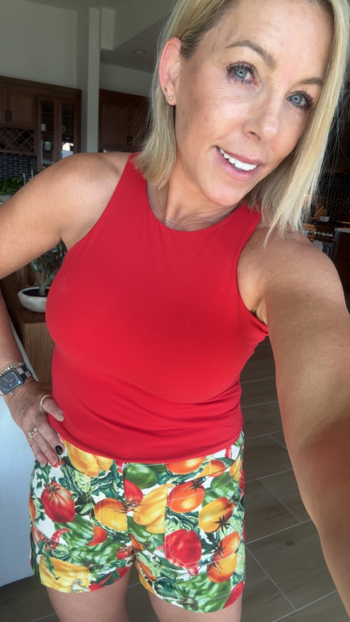 These printed tomato shorts are definitely different, but so cute and stylish—I love how they add a fun twist to my outfit. I’ve been pairing them with this little red tank, and it just pulls the whole look together. It’s easy, bold, and perfect for warmer days when you want something playful but still put together. 
