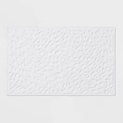 20"x32" Snow Leopard Bath Mat White - Threshold™ | Target