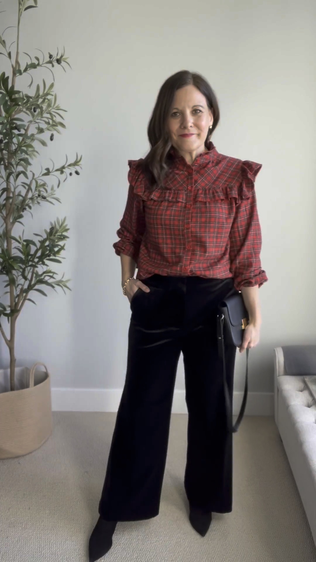 Here’s a classic dressy look. I’m pairing this classic red plaid Christmas blouse from Social Threads (fits TTS) with black velvet wide leg pants (size down).

#LTKHoliday #LTKMidsize #LTKOver40