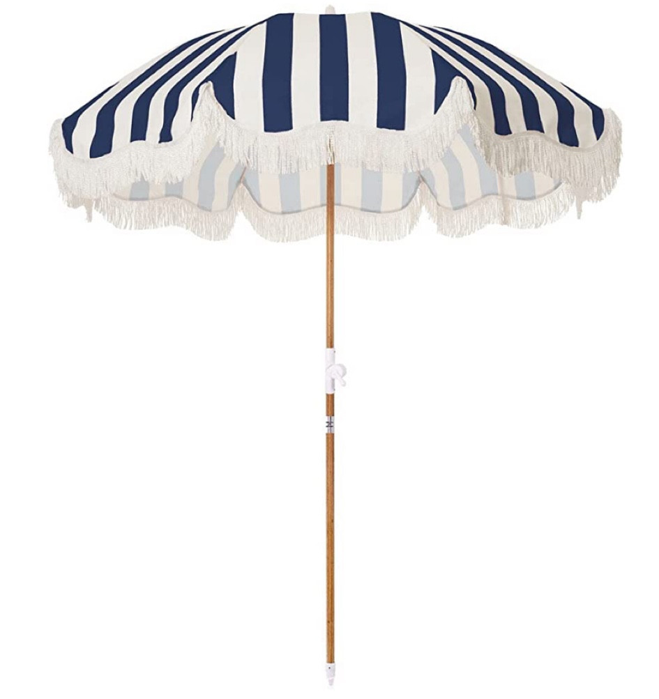 Striped coastal outdoor umbrella 50% off currently on Amazon Prime 

#LTKhome #LTKSeasonal #LTKFind