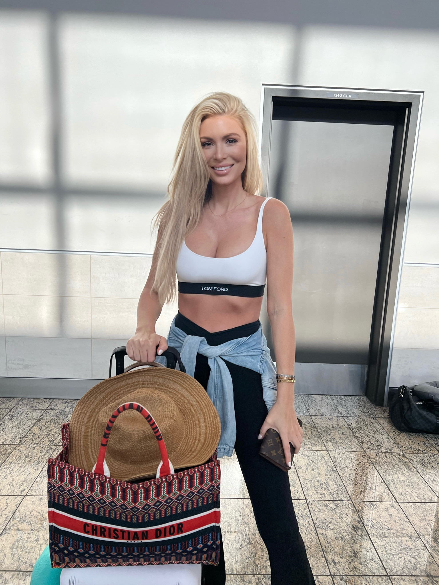 Travel outfit airport Tom ford sports bra fwrd 