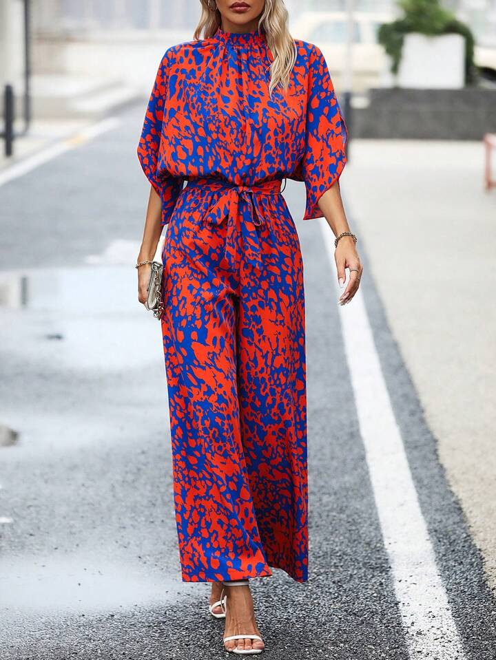 SHEIN Clasi Mono con estampado de manga murciélago con cinturón | SHEIN