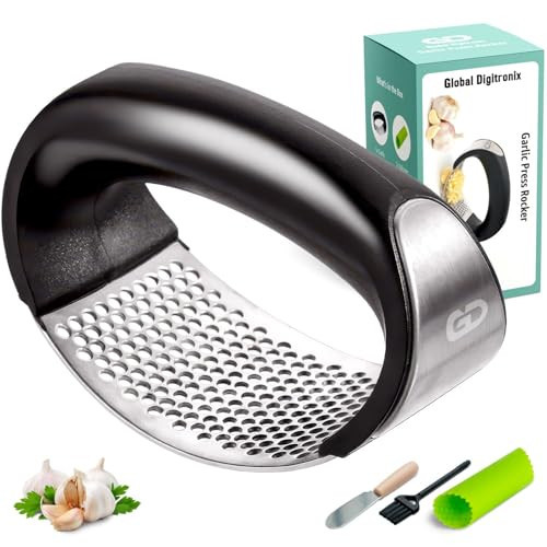 Garlic press rocker, crusher, mincer tool stainless steel with a Garlic Peeler, spatula, and Brush extract more Garlic Paste. The Garlic Mincer Tool Squeezes, Extracts, Crushes | Amazon (US)