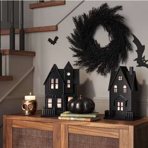 These haunted houses are pretty big (16”) and look great in person! 
🖤
Would really add to last years tin set or you can get this years tin set that I’m really loving too! You’ll have a mixture of wood with the black tin houses and it looks really cool! 
🖤
I tagged everything I think would match with this esthetic to make it easy.

#LTKSeasonal #LTKHome #LTKHalloween
