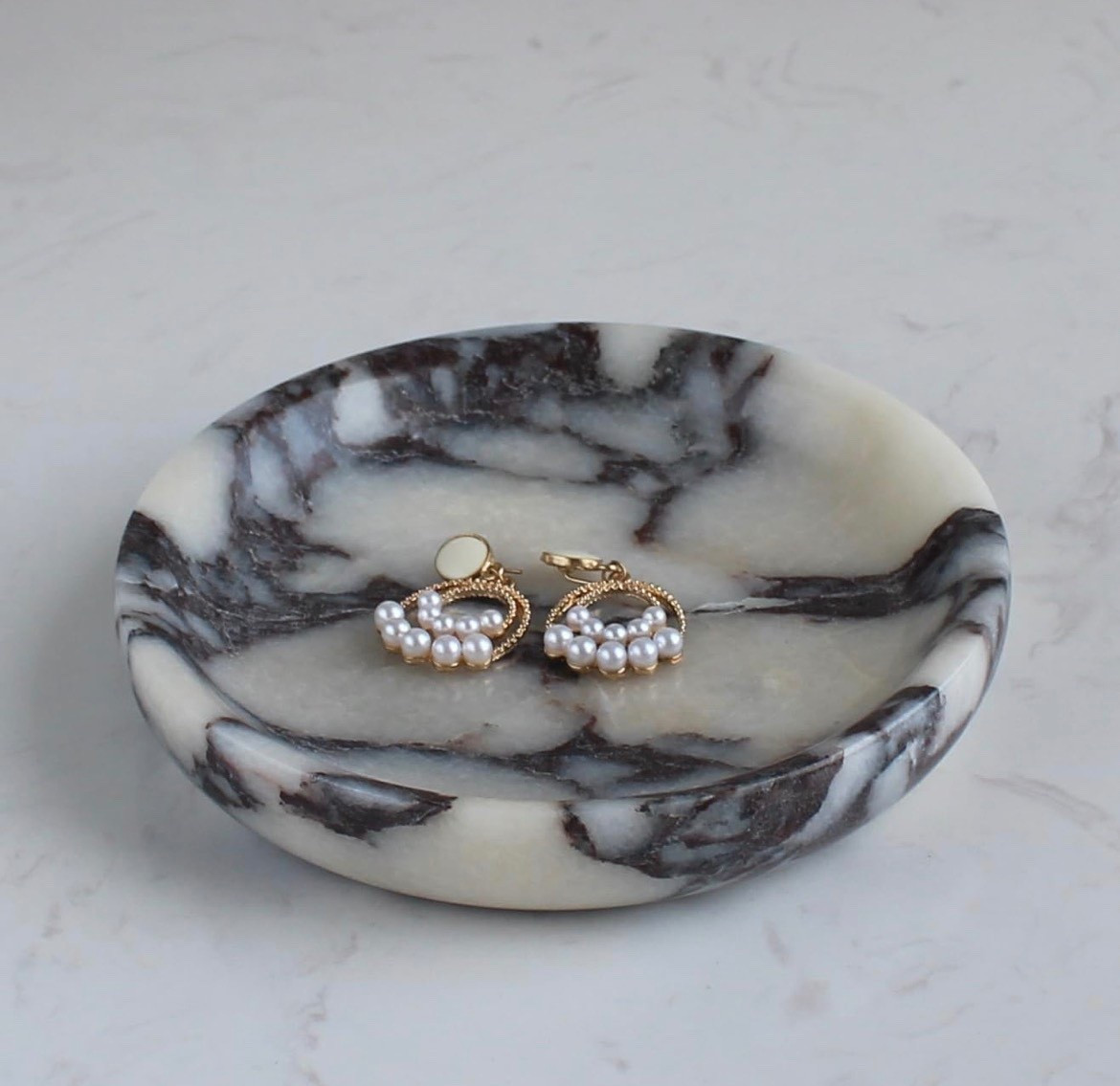 I have been craving something Viola calacatta in my home and I think I may have found the one I love 🖤🤍 I mean how cute would this look with a candle in it😍🕯️

Found some other amazing options too! 

#LTKHome