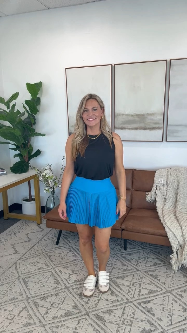 Bright blue and black is one of my favorite combos right now and this skort is so flattering and comfortable. It is lightweight, easy to move in, and perfect for staying cute and active all spring long.

Wearing size small top, medium skits, and 7.5 shoes

blue skort outfit, spring athleisure outfit, tennis skort outfit, pickleball style women, amazon outfit ideas, sporty casual outfit, flattering activewear, casual everyday outfit, spring color outfit, comfortable chic style, audriedollins

#LTKActive #LTKOver40 #LTKootd