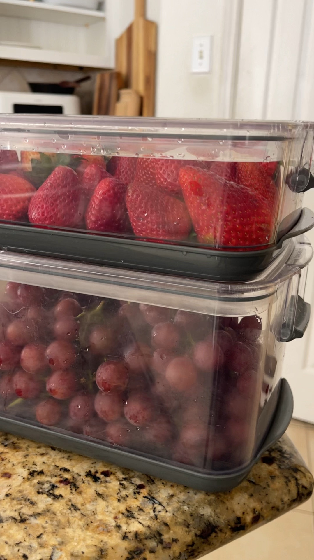 Shoutout to our favorite produce storage containers! Our strawberries and blueberries do so well in the refrigerator when stored in these did in these produce containers! Berries, grapes, even fresh cut fruits last so much longer in these clear produce organizers. 

Everything stays fresh and stored at in its optimal conditions - with air flow vents that can be closed airtight or left open for air flow depending on the needs of the food you’re storing. Additionally, things that need extra humidity get it via a water tray or otherwise produce stays high and dry in water draining / colander style straining containers. 

You can choose to wash your produce first and then store (this is what I do with all the fruits my kids love to snack on) wash first so it’s ready to eat! 
OR 
Choose to wash your produce items when you’re ready to use them. Often times I store veggies unwashed and then wash them in the container (that strains off water) then use as needed. 

You can even store cut produce in these boxes too! The excess juice run off into the drip tray to keep fruit from getting waterlogged. 

I cannot sing their praises enough because they keep the fresh produce accessible and visible in the refrigerator so my kids eat it all before it goes to waste. This is must have for kitchen organization!

#LTKVideo #LTKSummerSales #LTKHome