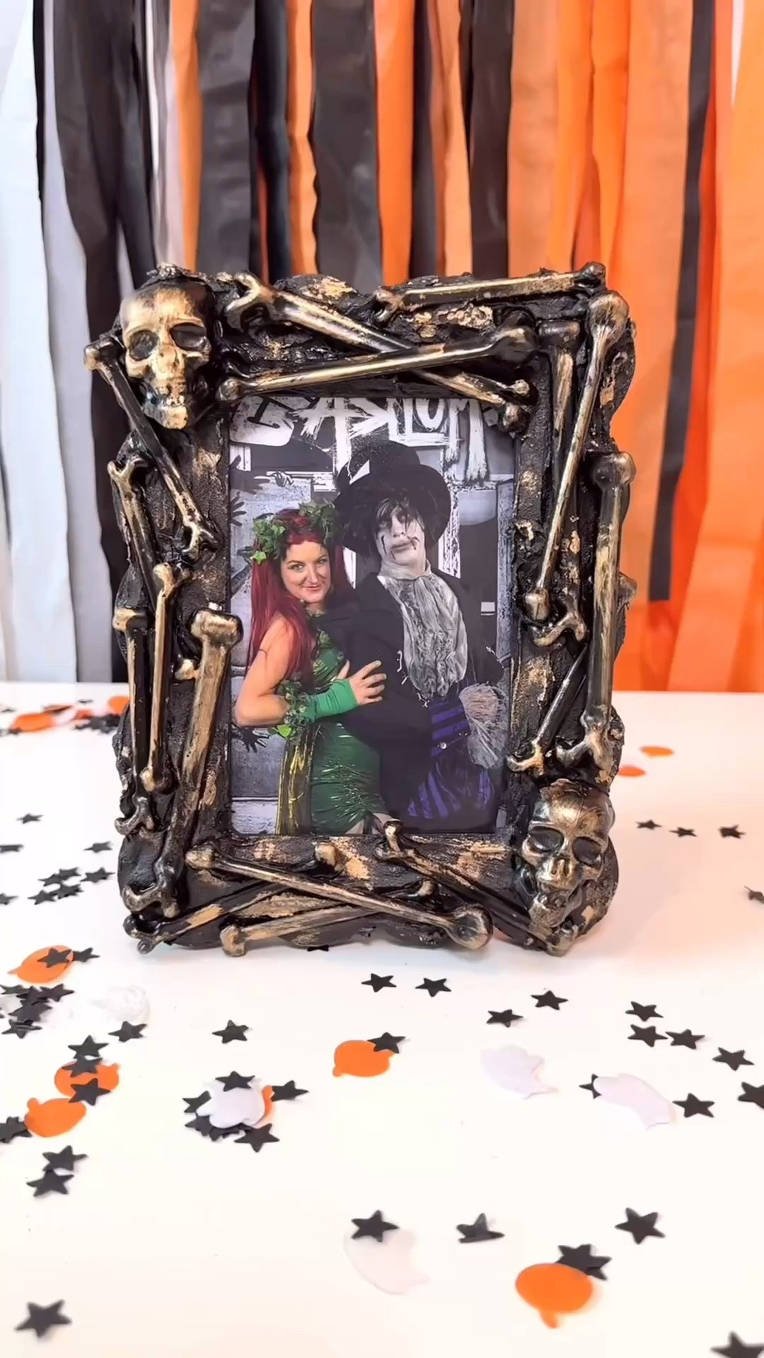just a bag of tiny bones 🖤
 
I gave this plain frame good bones — pressed into spackling, painted black, and finished with bronze rub n’ buff for that aged metallic look.
 
looks like a high-end Halloween piece and costs almost nothing! Bones from Dollar Tree but I’ve put alternatives you can get online!
 
made for memories, perfect for displaying your favorite costume photos.
 
note: I used DAP Fast 'n Final for the spackling base

#LTKmomlife #LTKSeasonal #LTKHome