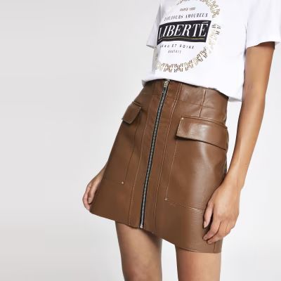 Brown faux leather zip front mini skirt | River Island (US)