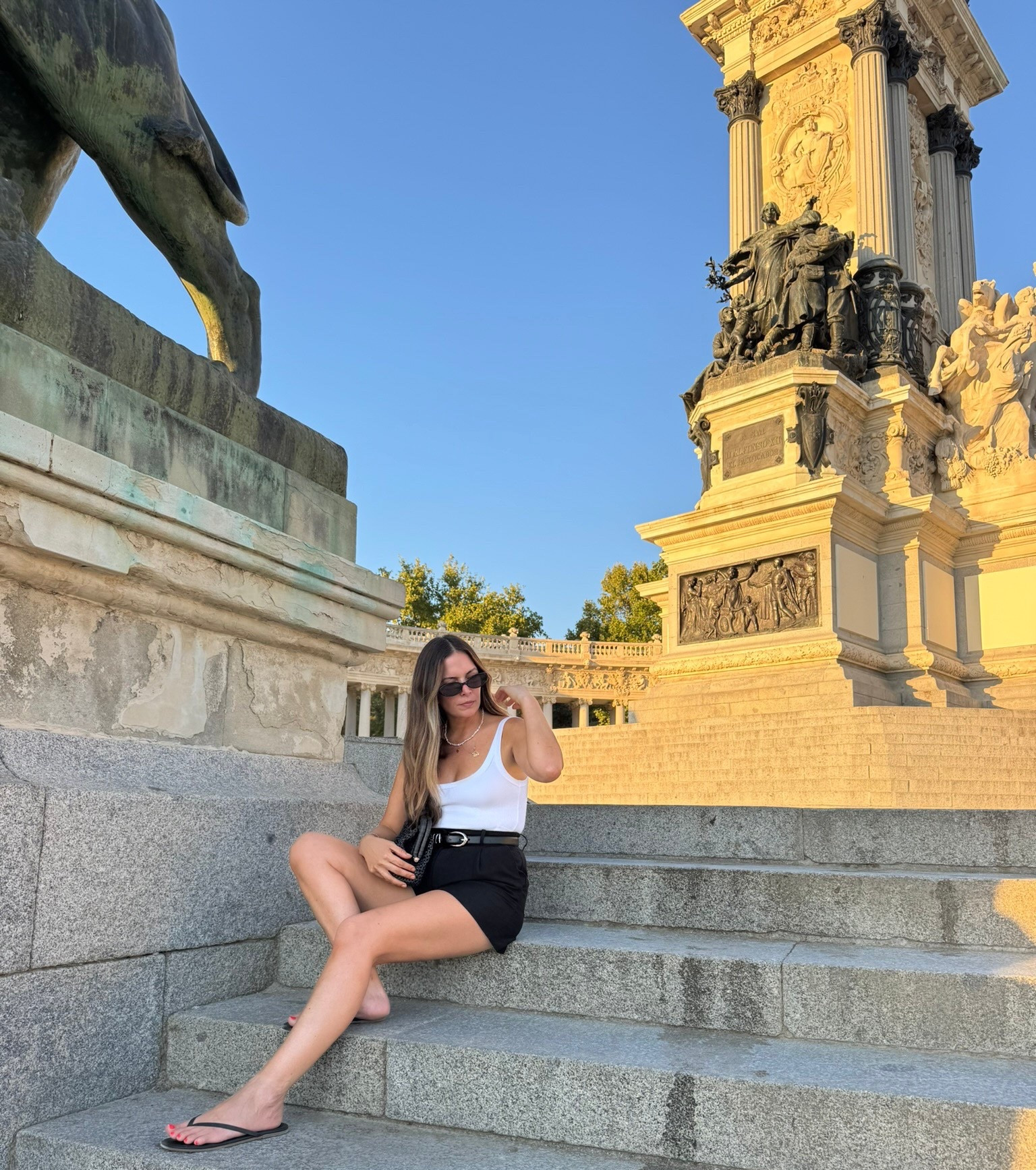 Summer in Madrid

Spain 
Shorts 
Bodysuit
Sandals 
Belt 
Sunglasses
Clutch 

#LTKootd #LTKTravel