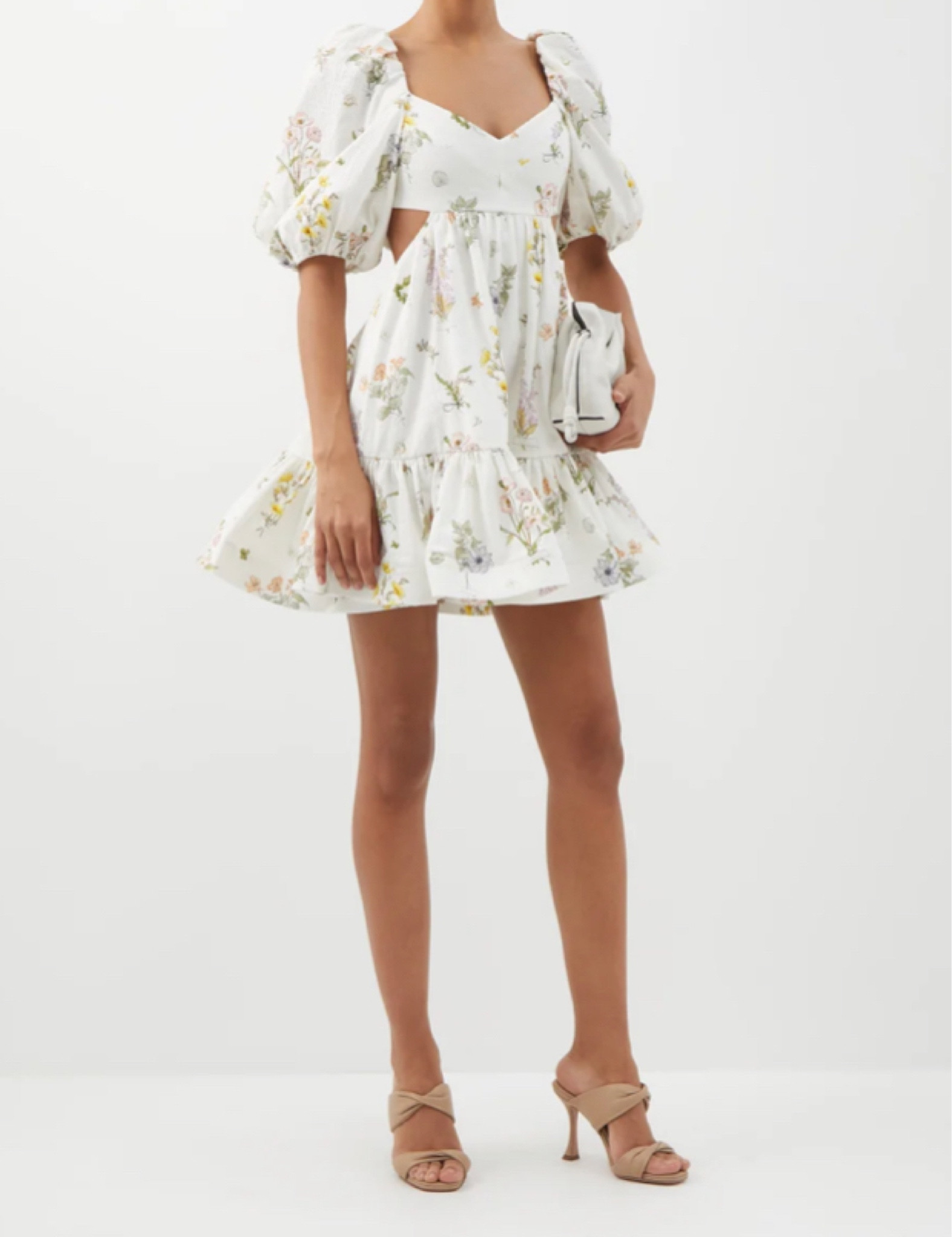 I love Zimmermann’s linen dress for Spring and Summer. This gorgeous babydoll style gives me Bridgerton vibes but sexier with the cutouts. 