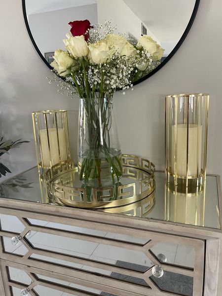 Two gold metal Hurricane candle displays with battery operated wax LED candles! 

#LTKunder100 #LTKhome #LTKstyletip