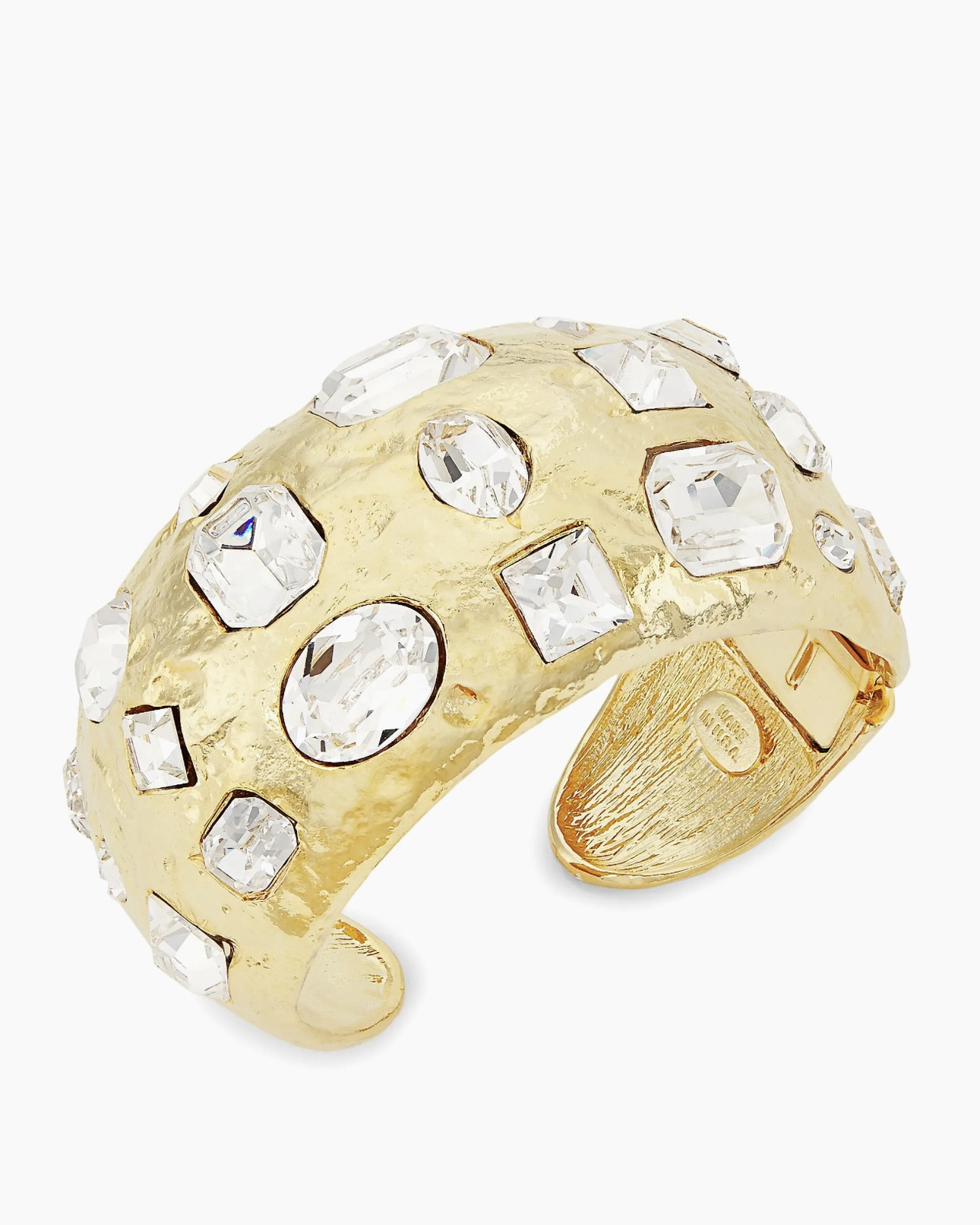 Kenneth Jay Lane's 22K-gold-plated cuff bracelet features shimmering mixed-cut glass crystals on a hammered open band.
Glass crystals
22K gold-plated metal
Open hinge closure
Made in the USA
SIZE
Diameter, about 2.25"

#LTKParties #LTKSaleAlert #LTKU