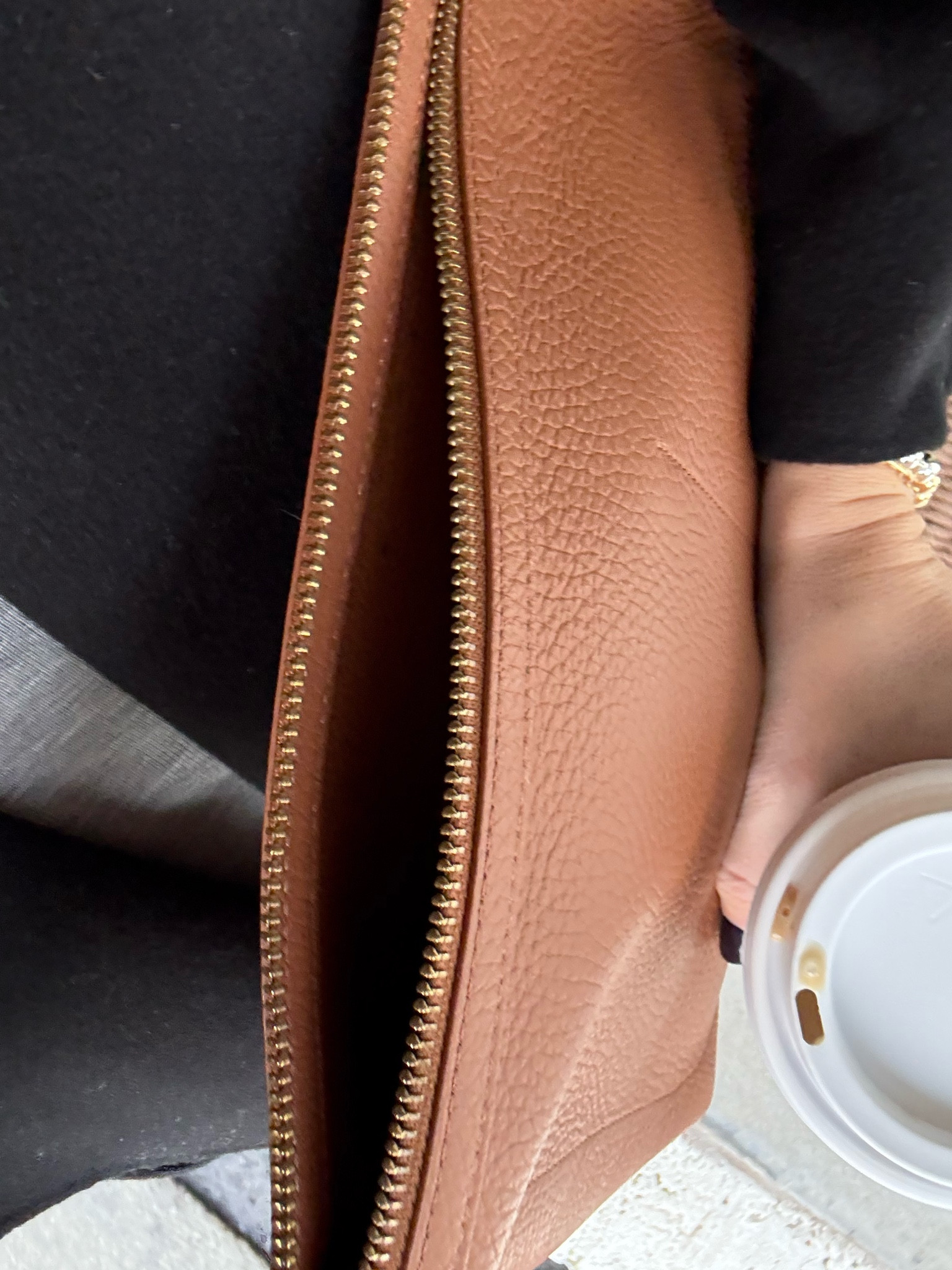 I have this pouch in the small and large versions and they are the best - love using as clutch, travel organization, and to throw all my purse things inside to easily grab and swap bags whenever I feel like it. Quality is so lovely as per always with Cuyana (in my experience) 