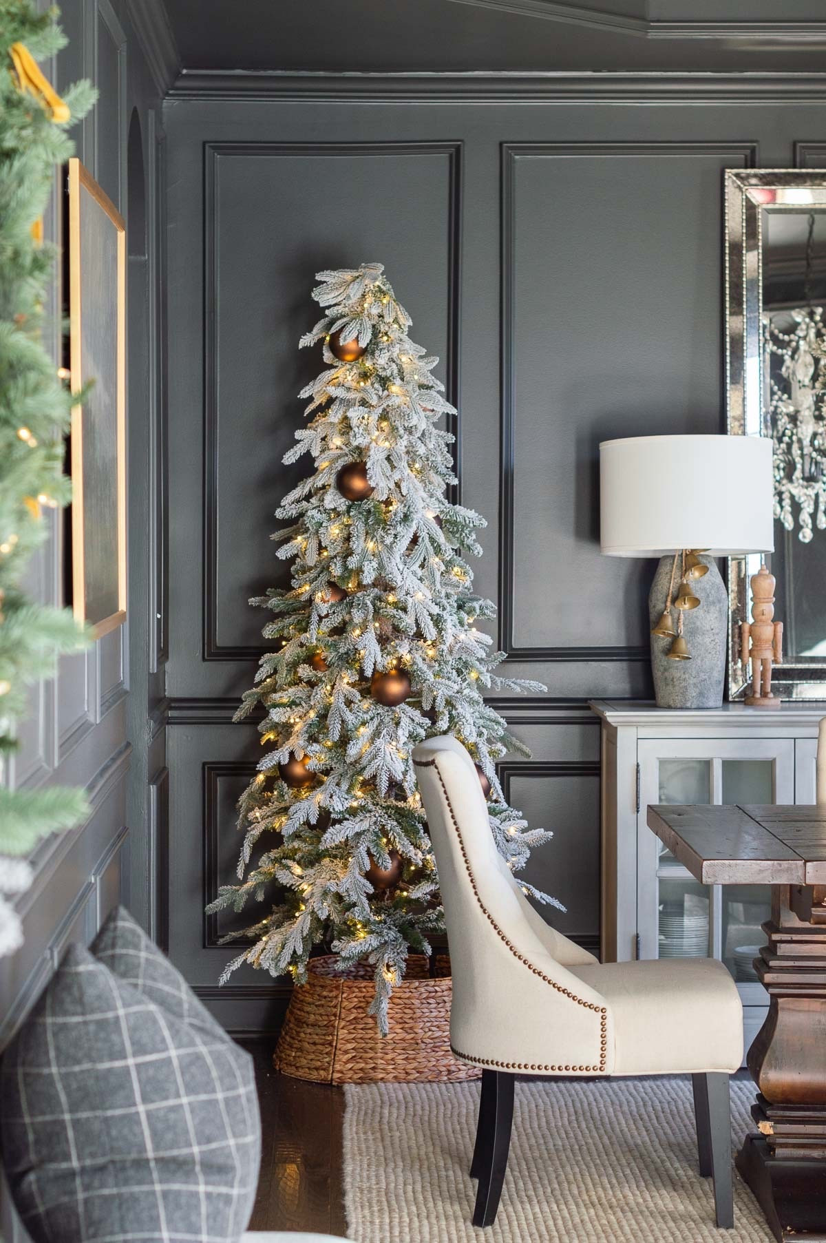 The dark Iron Ore walls in my dining room are the perfect backdrop for a simply decorated, pre-lit flocked Christmas tree. I added neutral toned ornaments and the rattan Christmas tree color is the perfect match. home decor Christmas decor dining room decor cement lamps jute rug#LTKStyleTip 

#LTKHome #LTKHoliday