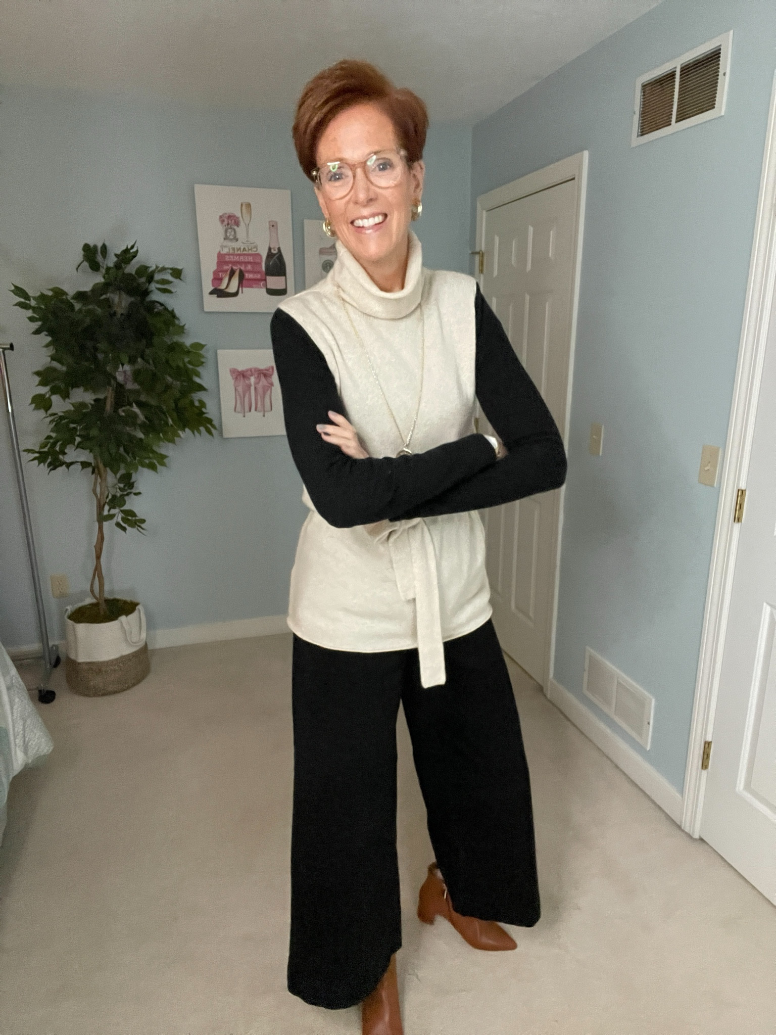 Black and white is my favorite outfit combination! Wearing this cream funnel neck sleeveless sweater with black wide leg jeans and brown boots.

Over 50 fashion, tall fashion, workwear, everyday, timeless, Classic Outfits

Hi I’m Suzanne from A Tall Drink of Style - I am 6’1”. I have a 36” inseam. I wear a medium in most tops, an 8 or a 10 in most bottoms, an 8 in most dresses, and a size 9 shoe. 

#LTKfindsunder100 #LTKworkwear #LTKover40