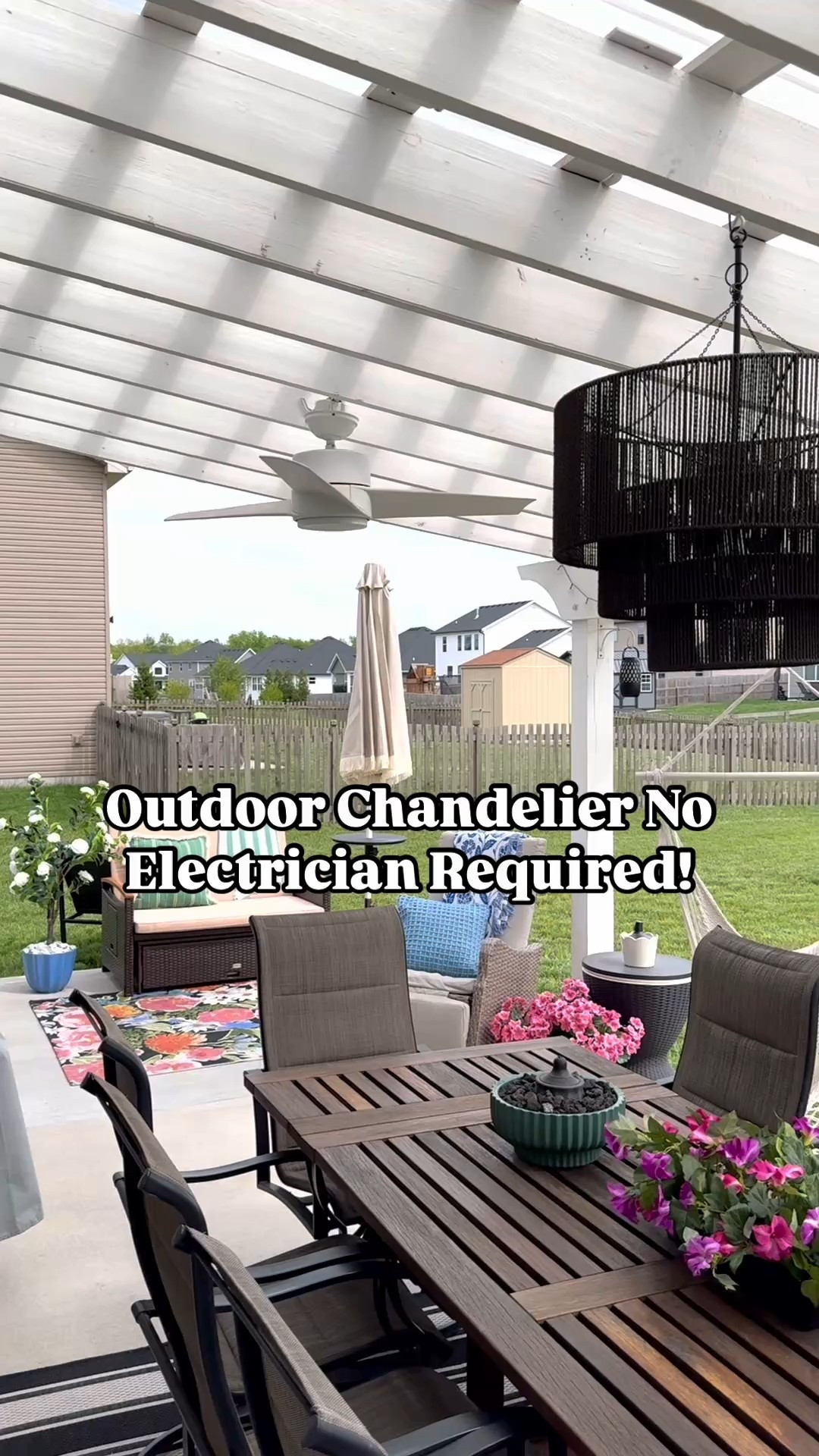 Outdoor chandelier, no hardwiring required! We bought a regular indoor light then sprayed it down with outdoor protectant spray that repels water & prevents fading. We flipped all the hanging hardware upside down so the ceiling mount plate is actually at the bottom! We removed the electrical wiring & pulled the solar light wire through the hanging pole. It was honestly so simple, just had to think outside the box a bit! We screwed in a heavy duty metal hook to our pergola to hang the light from. The solar light is remote controlled (there is also a switch on the light if you lose the remote 😂).

#LTKStyleTip #LTKSeasonal #LTKHome