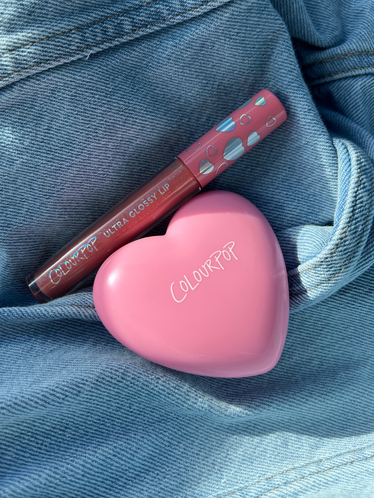 ColourPop’s Lost In Love collection for Valentine’s Day. Love this heart-shaped compact that’s a cheek and lip balm - so creamy and amazing color pay off! And the gloss smells so good!

#LTKSeasonal