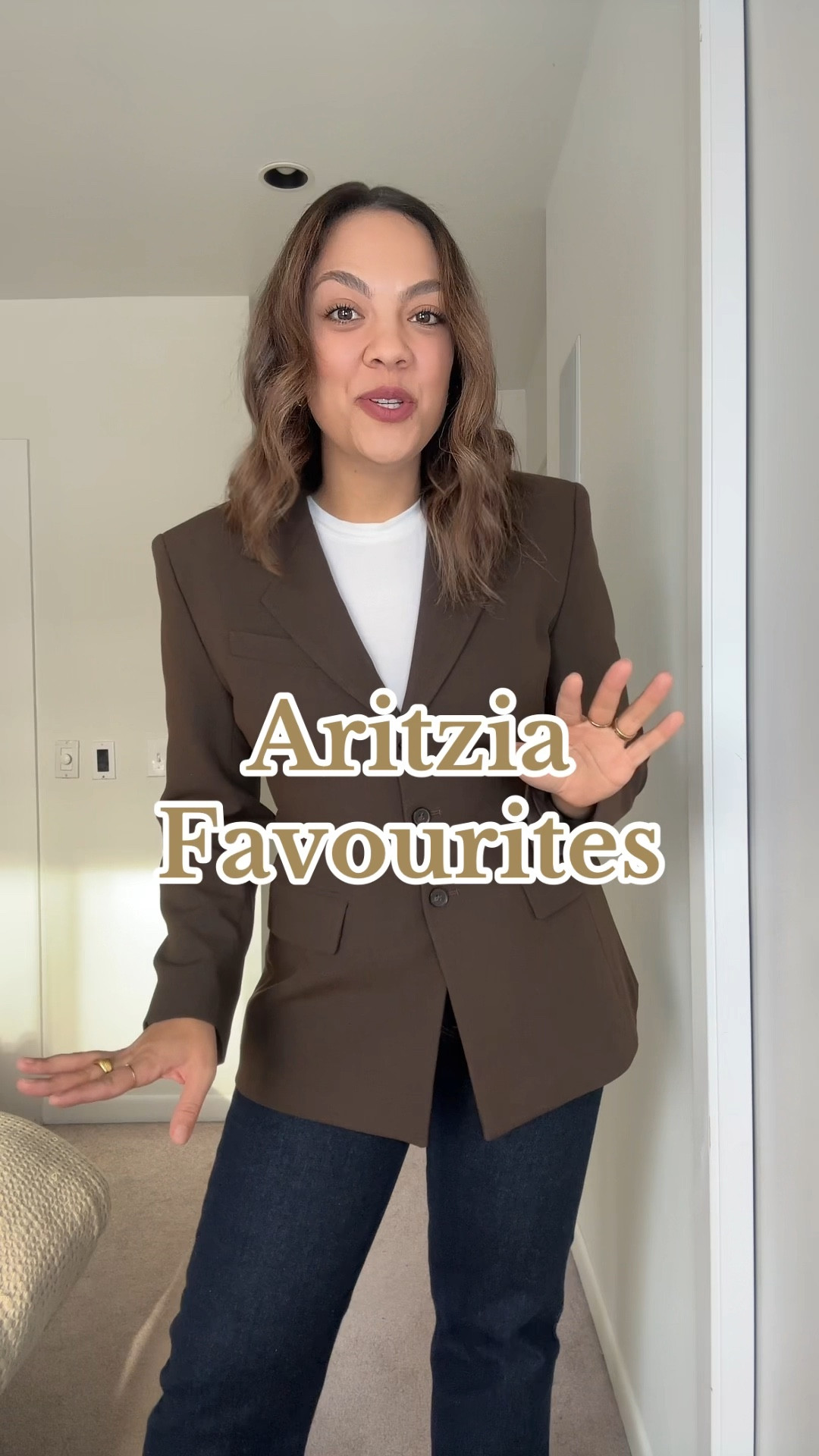Some of my Aritzia favourites!!

Outfit 1:
-Aritzia chocolate brown cinched waist blazer, I have a size 10 (the Standout Blazer). 
-White T-shirt, similar linked. 
-Levi’s dark wash long straight jeans, I have a size 30. 
-Franco Sarto brown calf height heeled leather boots. 
-Celine Ava Triomphe shoulder bag in canvas. 
-Celine Triomphe black rounded sunglasses in acetate. 

Outfit 2:
-Aritzia black oversized blazer, I have a size 10 (the New Generation Blazer). 
-Ganni black patent leather heeled buckled pumps. 
-Demellier London black crocodile print shoulder bag. 
-Same jeans and top as outfit 1. 

Outfit 3 and 4:
-Aritzia black collarless fitted button front blazer, I have a size 10 (the Regal Blazer). 
-Aritzia high rise wide leg black pants, I have a size 10 long (the Effortless Pants). 

Outfit 5:
-Aritzia brown high rise wide leg pants, I have a size 10 long (the Effortless Pants, similar colours linked). 
-Aritzia ribbed square neck tank top, I have a size medium (the Sculpt Knit Tank, I have the cream and the burgundy and black). 
-Aritzia cream button from shirt, I have a medium (the Freeform Shirt). 



#LTKworkwear #LTKstyletip #LTKsale