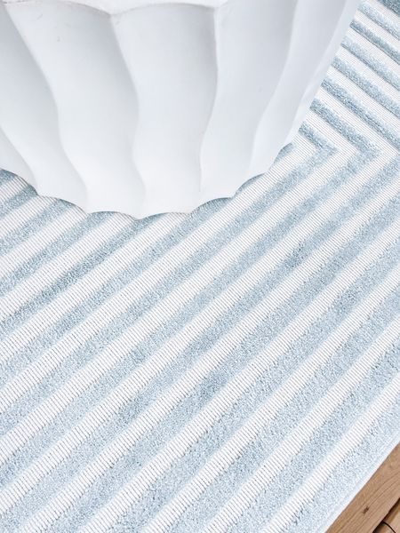Blue and white outdoor rugs. This one is soft and suitable for indoors too. 

#LTKSeasonal #LTKsalealert #LTKhome