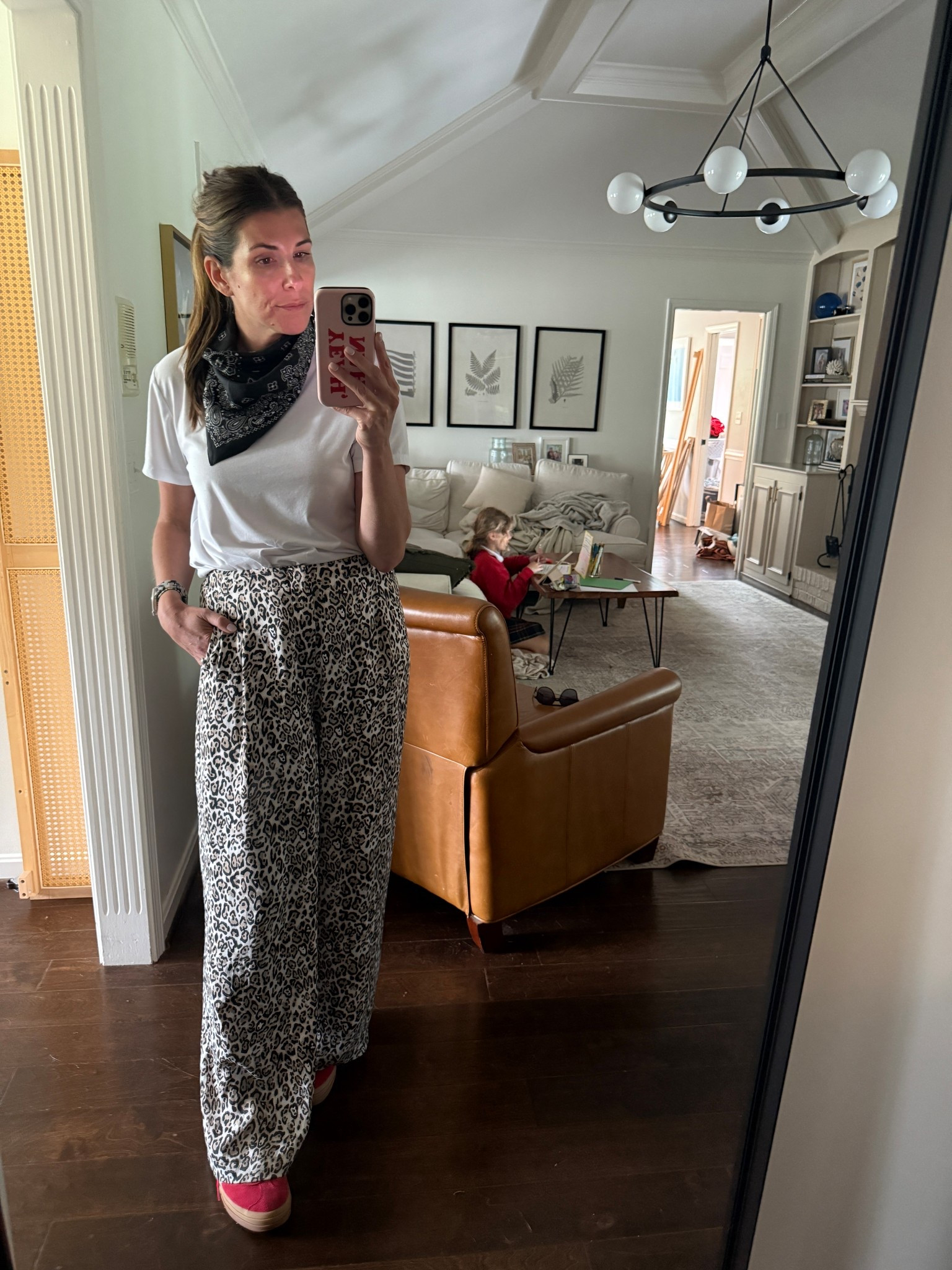 Wide leg leopard pants + the best white t-shirt from cuts. 

#LTKStyleTip #LTKFindsUnder100 #LTKOver40