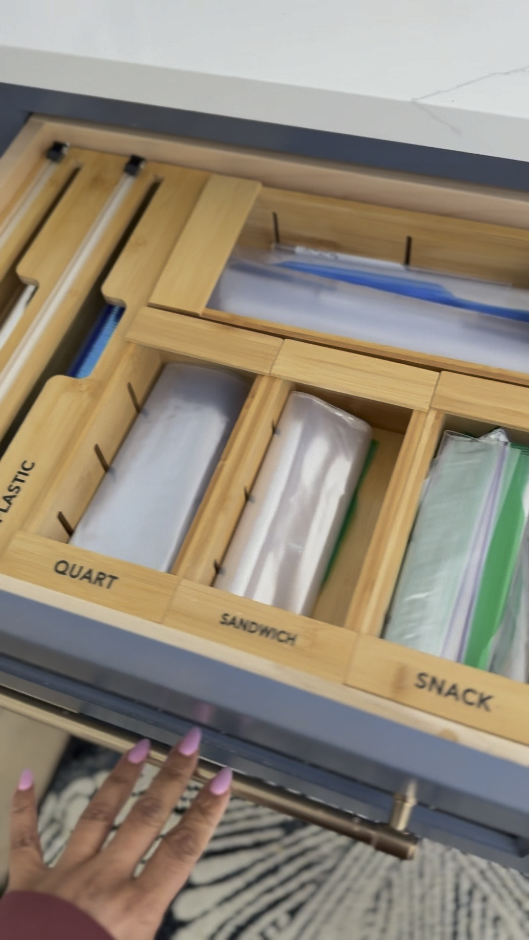 Kitchen drawer organizers for food storage bags and wraps, including foil, plastic food wrap, gallon freezer bags, quarter freezer bags, sandwich bags and snack bags.

#kitchenmusthaves #kitchenaccessories #kitchenorganizers #organizedkitchen #foodstoragebags #freezerbags #foil #plasticwrap #sandwichbags #kitchen #kitchenorganization

#LTKHome