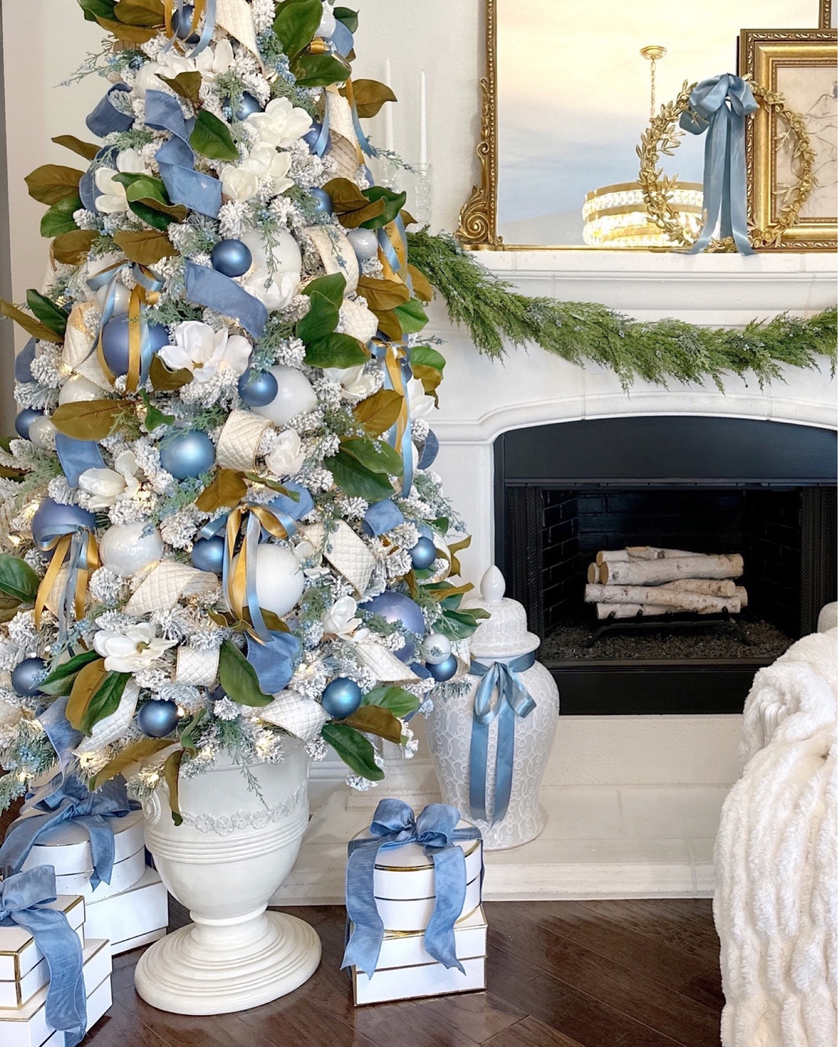 A look back at my Christmas tree from 2 years ago ✨ linked my exact tree and French planter 🎄 tree stand - on sale! French blue ribbon magnolia Christmas tree southern style grandmillennial decor 

#LTKSaleAlert #LTKHome #LTKSeasonal