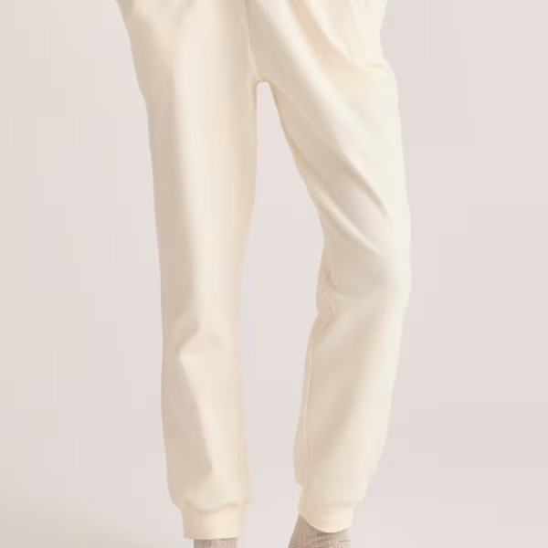 High Rise Joggers In Cream (L) | Wolf and Badger (Global excl. US)