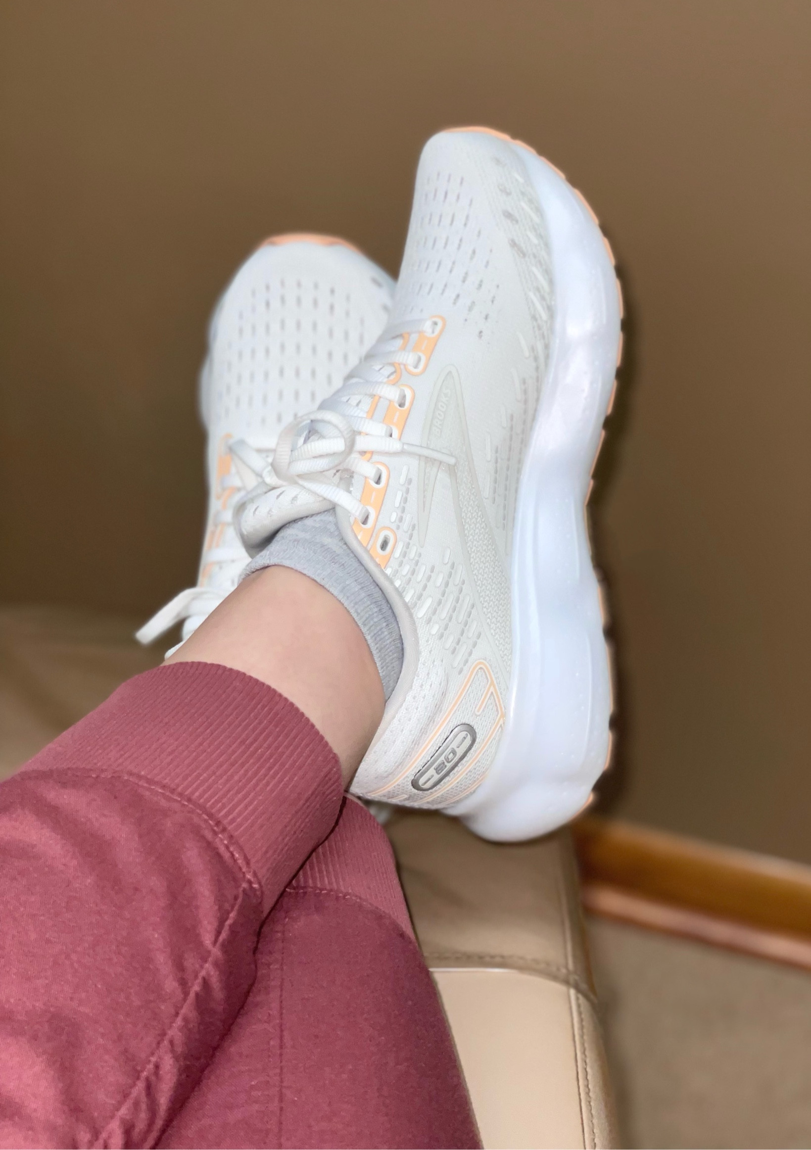 Here's the foot update you didn't ask for. Today marks 6 weeks since I had Lapiplasty (bunion surgery) on my left foot. Which means, I'm finally out of my boot! Hallelujah! Last night, I set out to try new shoes to accommodate my new foot situation. My foot/ankle are still a little swollen for the time being, especially since I am on my feet a lot more now, so went up a half size. I normally wear a 7, but went to a 7.5 trying the shoes on. I tried Hokas, On Cloud, and Brooks. Here's what I found; I really like the way On Cloud shoes look, but for me, right now, they were not comfortable and very narrow. I even tried on a 7.5 wide and they felt really tight, so that was disappointing. The Hokas felt good, and I didn't have to get a wide, but I wanted a neutral color and they didn't have any in the store. Then I tried on the Brooks Glycerin 20.
They felt the very best and I liked the way the looked. I want the most comfort, but I don't actually want to look a hundred years old either.
The Brooks Glycerin already have a wide toe box, so I got a regular 7.5. It feels weird walking in regular shoes today, but I'm doing okay. So far, I am happy with my decision! Keeping the Advil/Tylenol and ice pack close by!

#LTKworkwear #LTKshoecrush