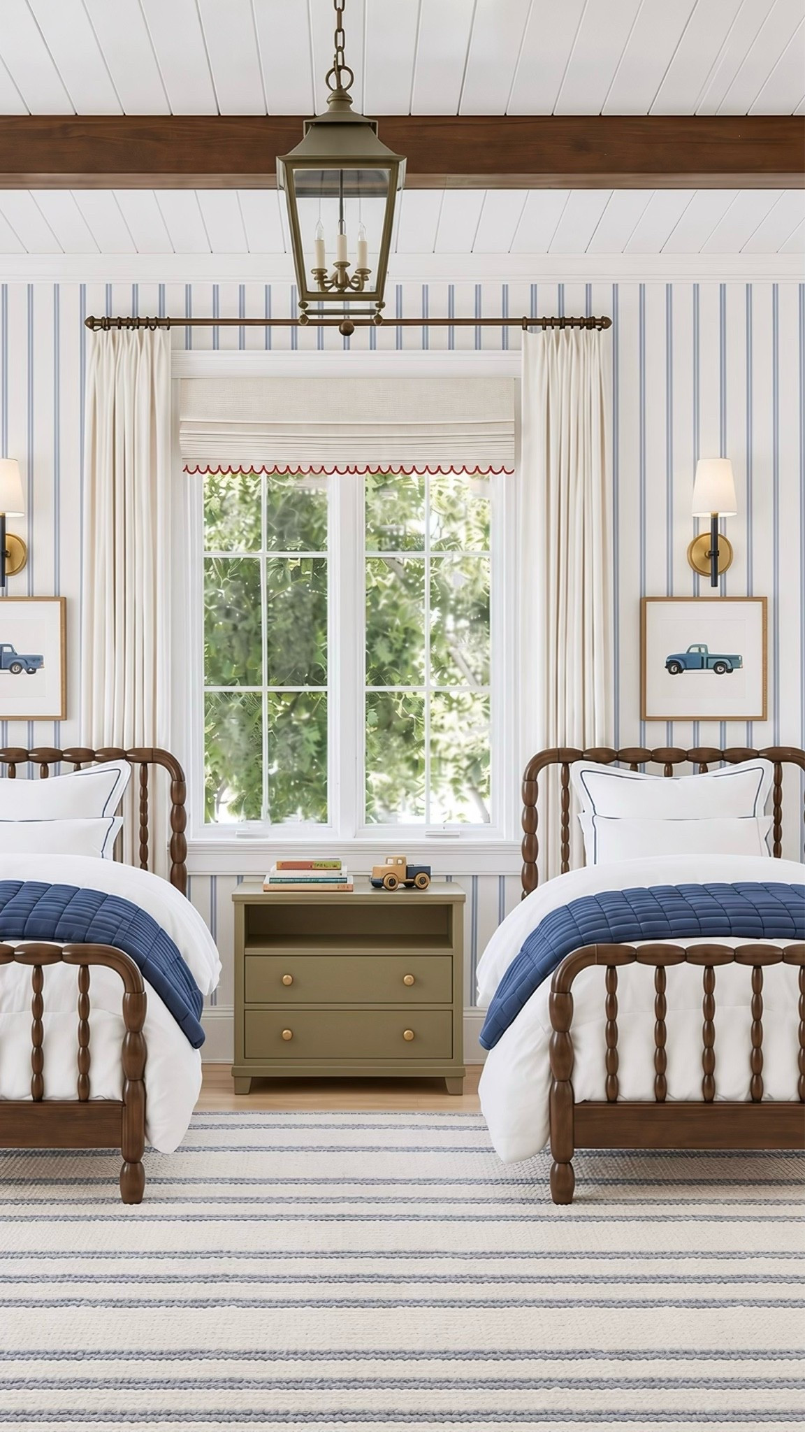 Little boys room with twin spindle beds, striped wallpaper, roman shades, preppy accents and a custom vibe.

#LTKHome

#LTKHome