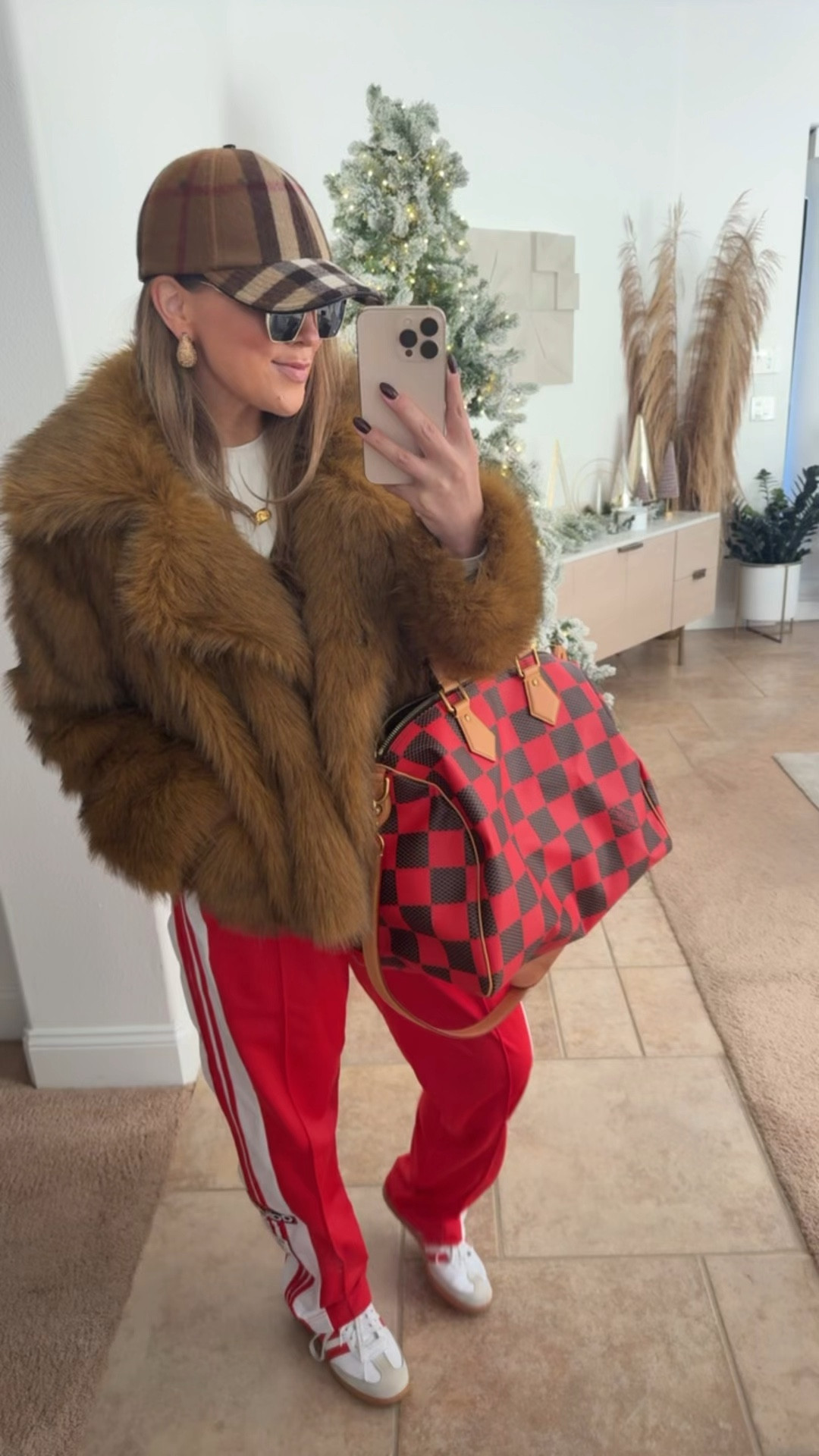 faux fur coat and track pants outfit 

#LTKSeasonal #LTKHoliday #LTKStyleTip