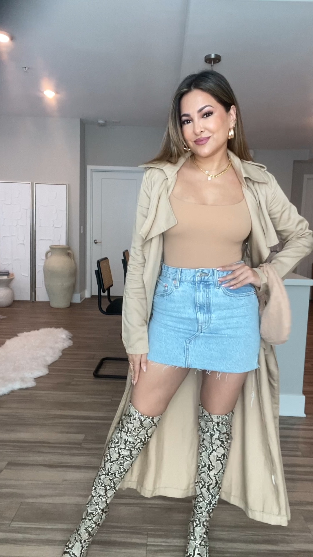 GRWM: Styling My New Denim Mini Skirt Pt. I✨

Styling snake print boots!

Outfit Details:
top — @skims color “ochre”
skirt — @mango 
shoes — @mango faux leather older style 
trench coat + bag — @showpo size US4
earrings — @ettika 
necklace — @saintliz 
perfume — @muglerofficial

#LTKstyletip #LTKbeauty #LTKunder50