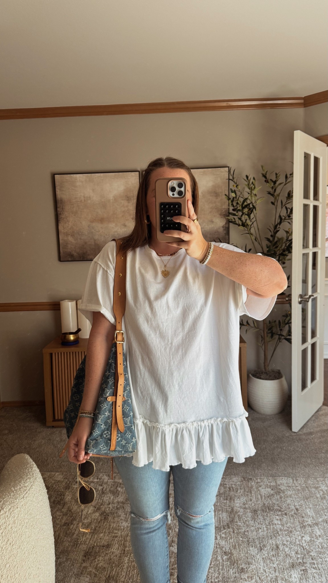 Midsize Casual Spring OOTD 🩵 I sized down to a Medium. It def runs oversized! 

The one from Amazon is on sale! Also, linked the FP as another option for different colors! (They are both Free People, one is just sold through Amazon) 

Size 12 | Large | 5’4” 

#LTKMidsize #LTKStyleTip #LTKFindsUnder100