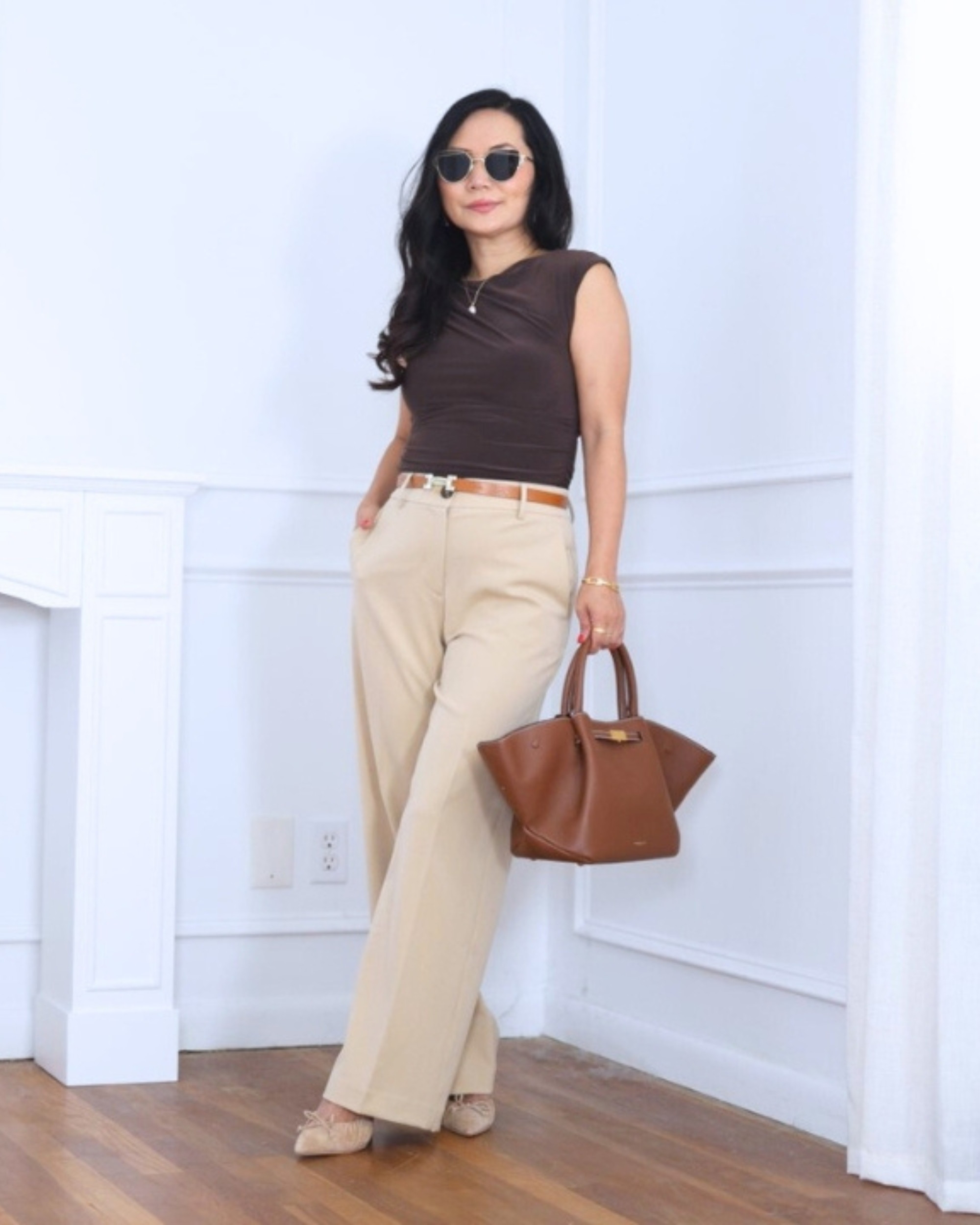 Wearing a ruched top from Aritzia with wide-leg pants from Ann Taylor — a mix of feminine and tailored that feels effortlessly chic. I’m 5’2, wearing size S.

#LTKPetite #LTKStyleTip #LTKOver40